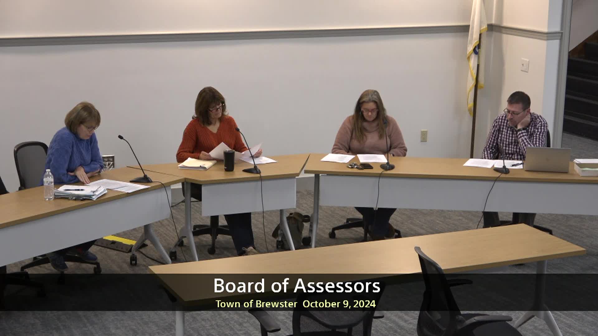 Thumbnail of meeting video shows the entire board and one staff person in meeting Rm B