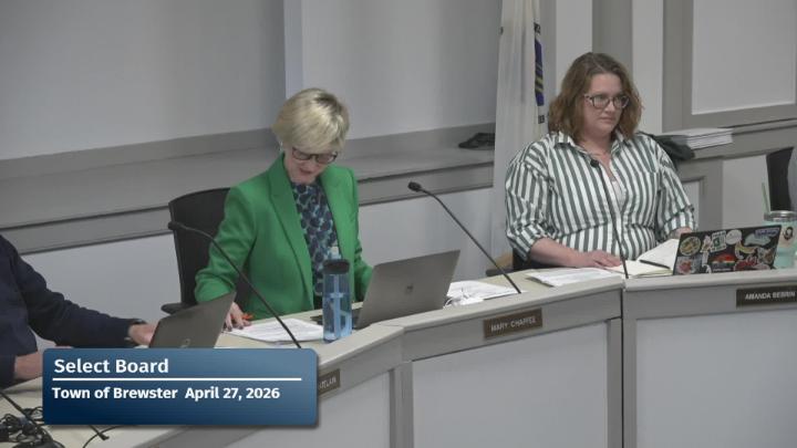 A close up of the chair and vice-chair of the committee during their meeting