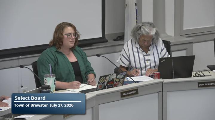 A close up of the chair and vice-chair of the committee during their meeting.