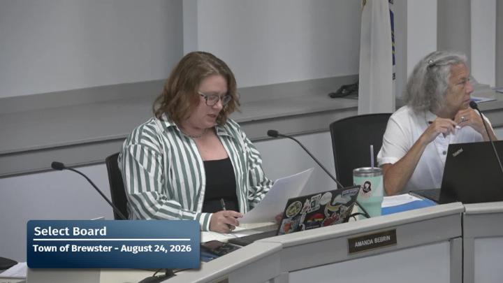 A close up of the chair and vice-chair of the committee during their meeting.